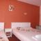 Foto: Guest House Orchidea 24/59