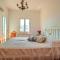 casa con giardino, garage, wi-fi, 2 bagni e AC in una camera da letto
