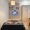 Appartement 1 Chambre, cuisine, coin salon, salle de bain