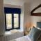 1750's cottage with open fire and beams - Upholland