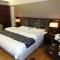 Foto: Tianjin Tower Jinhai Superior Hotel Apartment 26/109