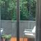 Sunny apartment with forest view