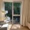 Sunny apartment with forest view