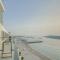 Trophy 2BDR Sandy Shores Retreat with Panoramic Sea View & Private Beach Access
