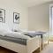 Moderne Apartments im Herzen der Stadt I private Tiefgarage mit Ladesäulen I home2share