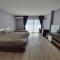 BEACH FRONT modern room + Free hi speed Wi-Fi