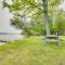 Cozy Carp Lake Cottage with Dock, Kayaks and Fire Pit - Carp Lake