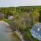 Lakefront De Tour Village Home with Deck and Fire Pit! - Drummond