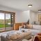 Teton Melody by KABINO Partial Air Conditioning Hot Tub FirePit Foosball Telescope Games WiFi Grill Mtn Views