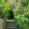 Tregarthen Cottage - tranquil self-contained room near Looe offering easy parking right outside with EV point
