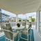 Condo with Deck Walk to Beach and Convention Center!