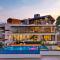 Pearl Lakeview Mansion by StayVista - Lakeside villa with Infinity pool, Jacuzzi, In-house theatre & Games room