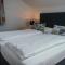 Pension Steinbichler - Apartments und Zimmer Check in 24-7