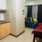 Two Palm Tree Villas Condominium - Studio 8th FL with Balcony - Across Terminal 3 Airport - مانيلا