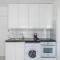 White 1-Bedroom Apartment By Mackenzie Beach