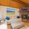 Sherwood Cottage - Charming and cozy cabin that has back deck with a Hot Tub!