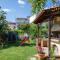 Beachfront Penelope Home with Private Jacuzzi, BBQ & Playground, Walk to Everything
