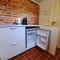 RED BRICKS basement studio apartment