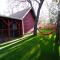 Cozy Red Cabin - Nestled in a cozy neighborhood, short walk to Sugarloaf Park! Hot Tub!