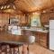 Forest Edge Retreat - Cozy, log cabin with a wood burning fireplace! Pool Table, Foosball and Darts!