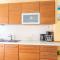 Charming Orange Apartment with Private Pool and Garden Oasis