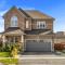 Oshawa Family Haven - Luxury 7BR Villa with Cozy Fireplaces & Hot Tub