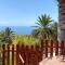 Cabaña Los Palmeros, vista al mar y la montaña