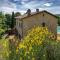 Experience the charm of Tenuta Le Caselle, a cozy farmhouse surrounded by nature and comfort!
