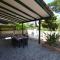 Gianira villa with shaded garden and Pt58 air conditioning