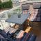 Roof terrace apartment with pool, bikes included