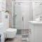 Sunny Seaside Apartment with Terrace & Parking by Noclegi Renters