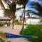 Coconut Beach by Grand Cayman Villas & Condos - Driftwood Village