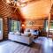 Les Chalets Tourisma - Chalet en bois rond avec spa - Chalet du 4e