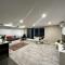 Dana-Cozy Apartment with Shared Entry in the City