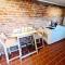 RED BRICKS basement studio apartment