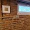 RED BRICKS basement studio apartment