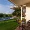 Lakeside Summers by StayVista - Mountain and Waterfalls view, Terrace, Pool & Snooker table for a perfect getaway - Trimbak