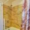 Walk to Williams District Home with Hot Tub and Patio