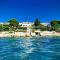 Luxury Seaside Villa with a classic Mediterranean Olive Garden, a fully equipped Professional Kitchen, Pool, Sauna, Padle Boards and Canoe - Miolin Beach House