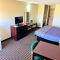 Designer Inn and Suites