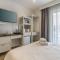 Studio 33 with a double bed & kitchenette at the new Olo living