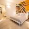 Resilienza Tropical Apartments & Room