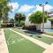 Breezy condo with deluxe pool and private beach access