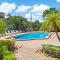 Breezy condo with deluxe pool and private beach access