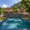 Prakriti with River View- Pet Friendly Retreat with Plunge Pool by StayVista - 比姆塔尔