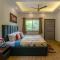 Prakriti with River View- Pet Friendly Retreat with Plunge Pool by StayVista - 比姆塔尔