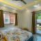Prakriti with River View- Pet Friendly Retreat with Plunge Pool by StayVista - 比姆塔尔