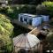 Tiny house with greenhouse dining Tiny house with greenhouse dining