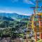 SKY HIGH VIEWS!!-Peak Mountaintop-Outdoor Pool-Close to Downtown-Private Balcony-WiFi-Cable