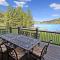 Lakefront home with fire pit and dock Near Wisp Resort